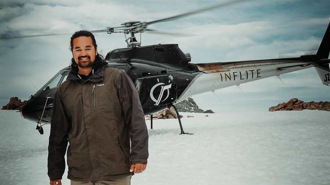 50261808_1271867636288054_249876283838693376_o Guy smiling with the black helicopter background in mt cook