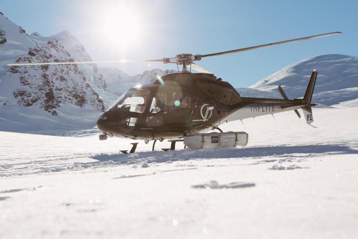 Helicopter lands on Mt Cook in New Zealand