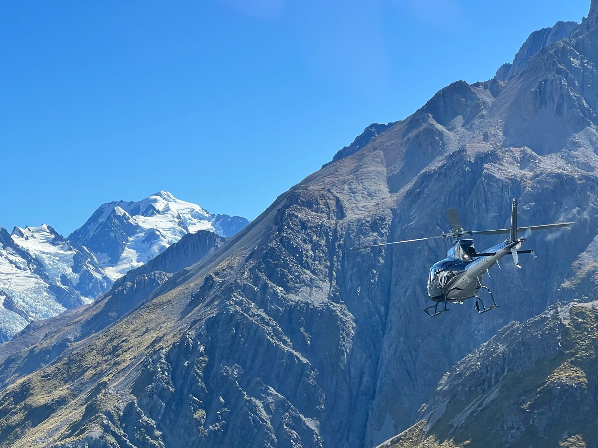 Helicopter flight in mountains at Aoraki/ mount cook national park