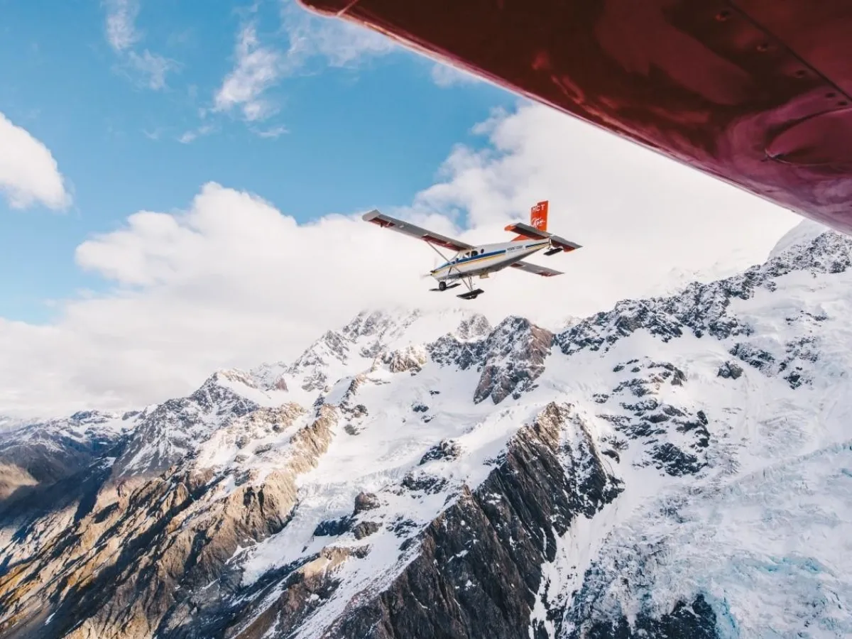 Ski planes flying over Mt Cook
