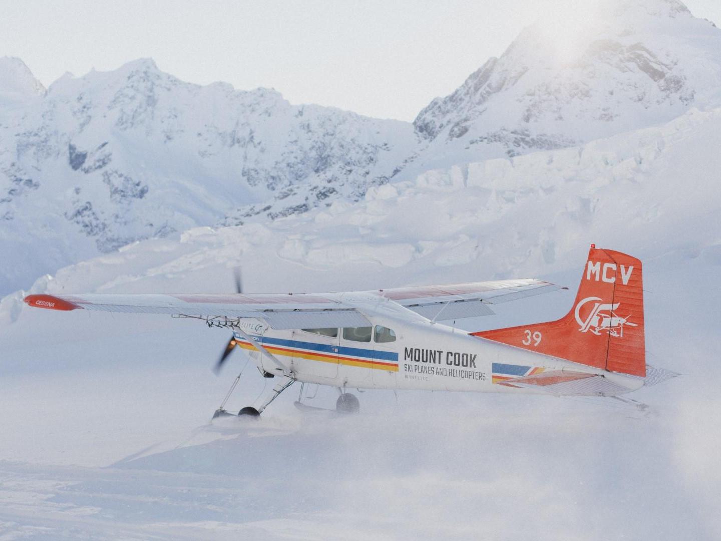 Ski planes lands on mt cook