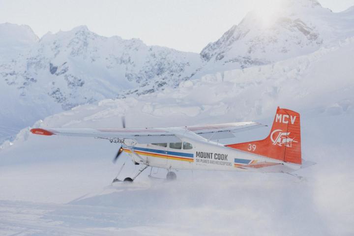 Ski planes lands on mt cook
