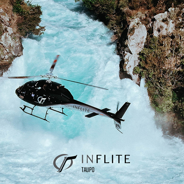 Helicopter flying over River Waterfall