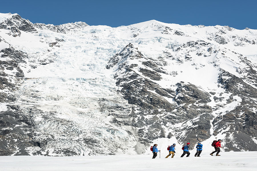 Heli hikers making their way up the Tasman Valley