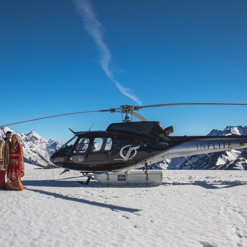Wedding Couple next to NZ Helicopter in Winter