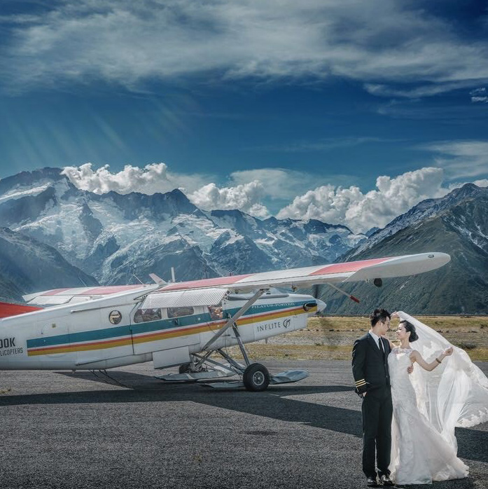 Wedding Charters 19-20 FIT from 1st Apr 2019 onwards1 a group of people standing around a plane