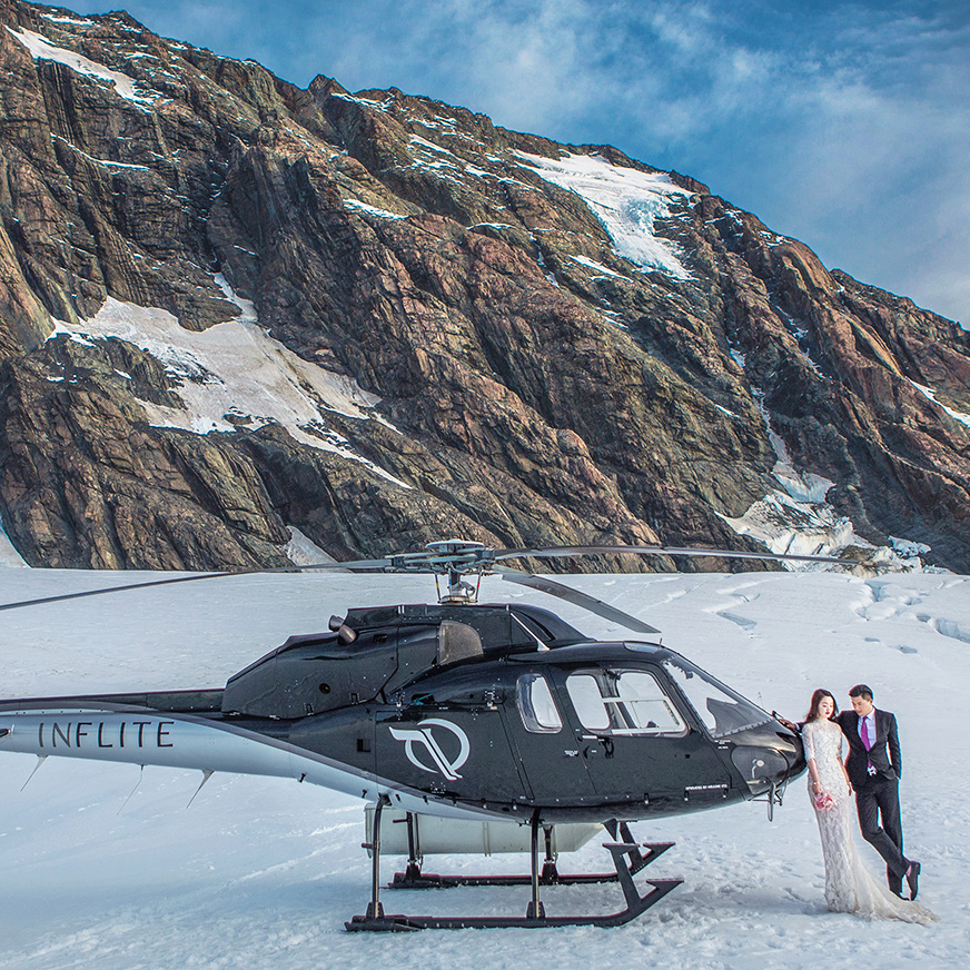 Wedding Charters 19-20 FIT from 1st Apr 2019 onwards3 a man standing on top of a snow covered mountain