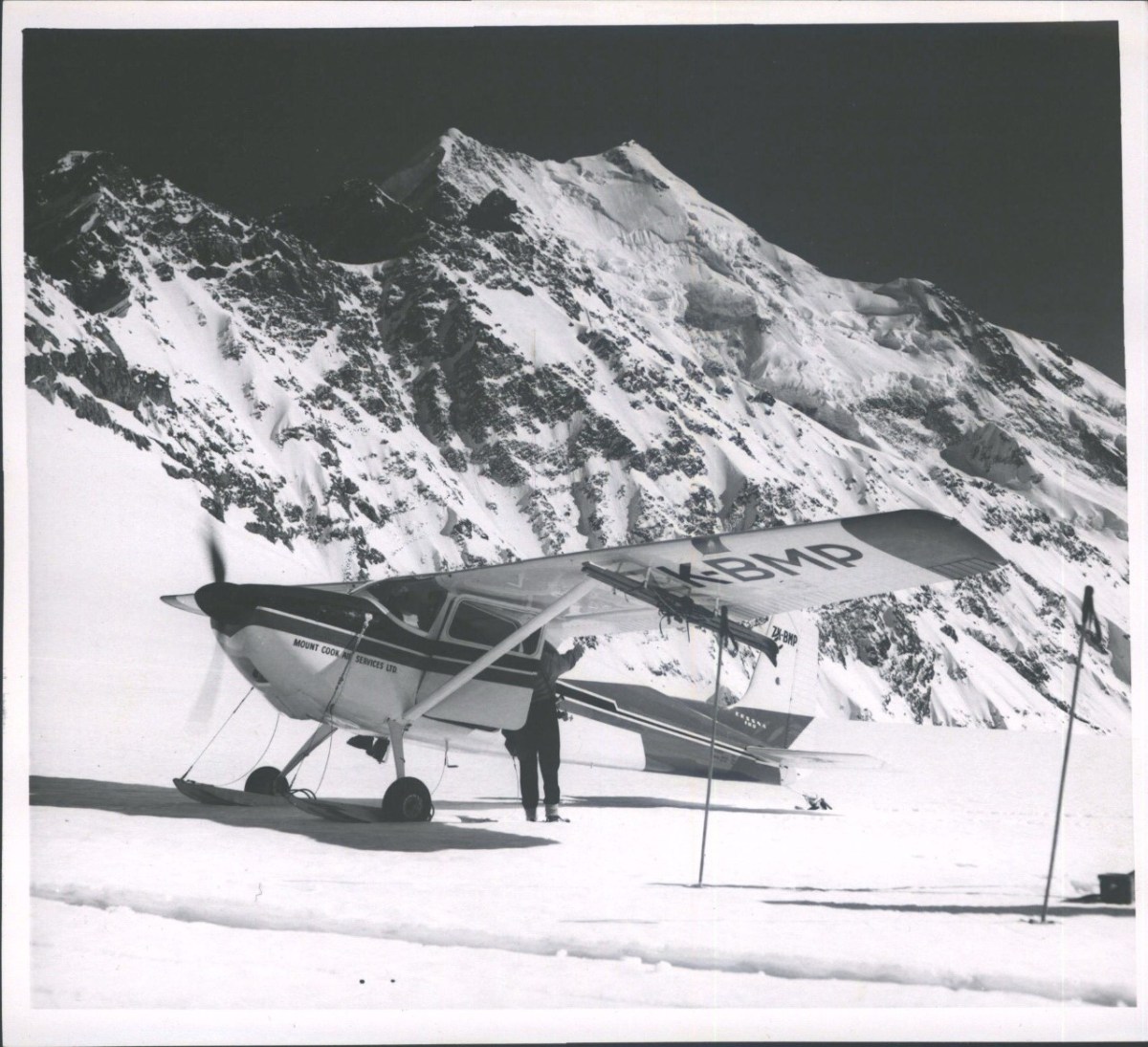 BALL PASS LANDING 1976 HOKEN LIBRARY 1 a airplane that is covered in snow