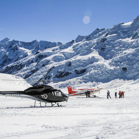 Mt Cook Ski Plane and Helicopter on a Mountain Peak at Winter