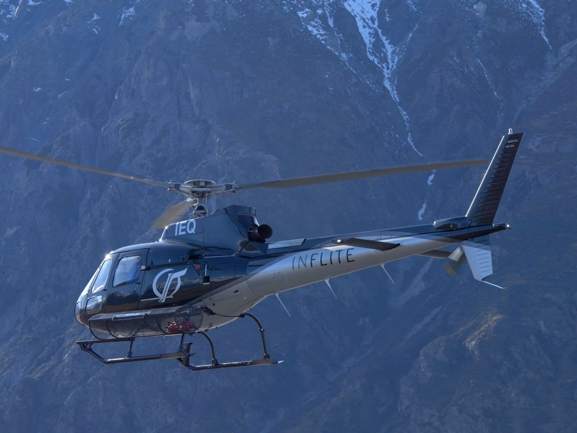 a helicopter flying over aoraki mountain cook national park