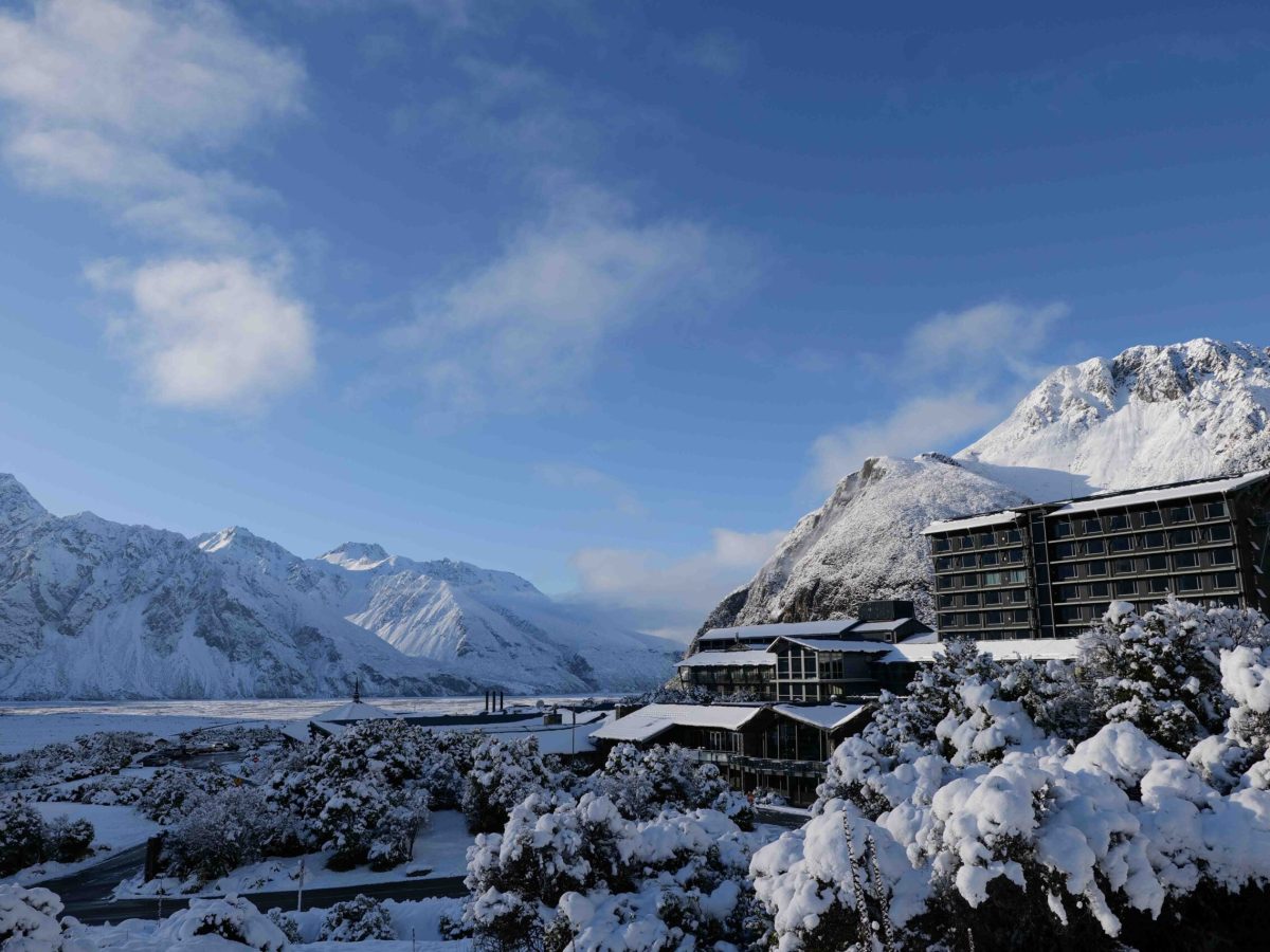 the hermitage hotel on a mountain side in aoraki mount cook national park