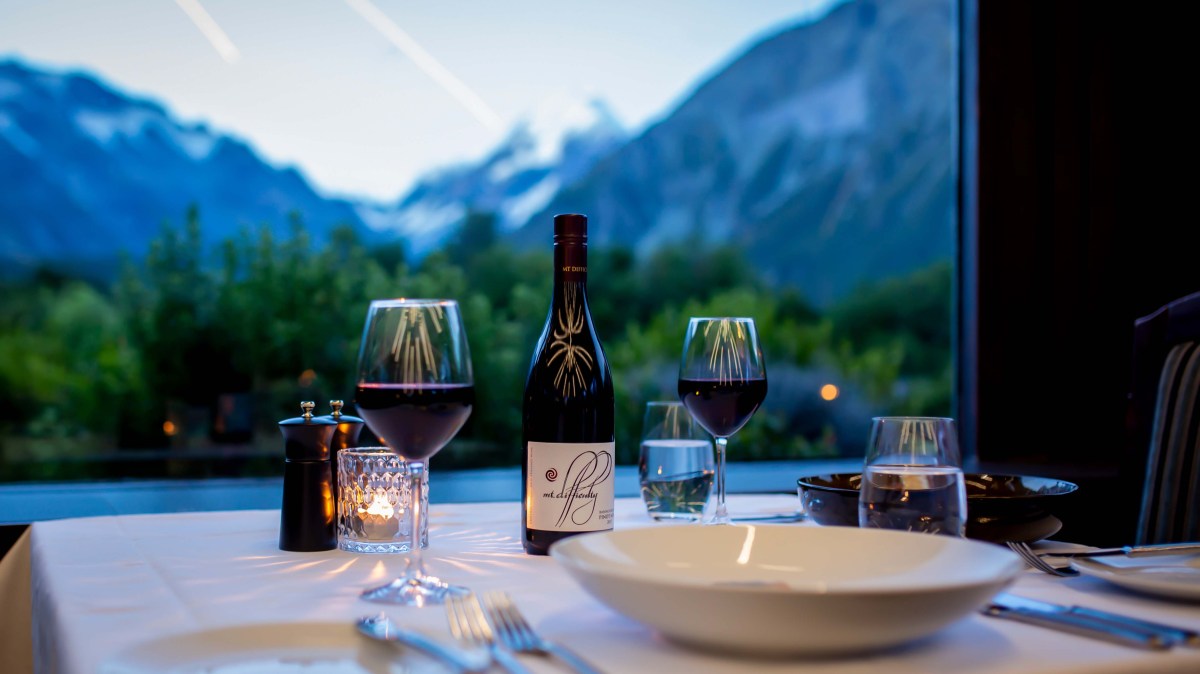 a glass of wine on a table in the Panorama Restaurant