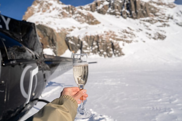 a man that is standing in the snow