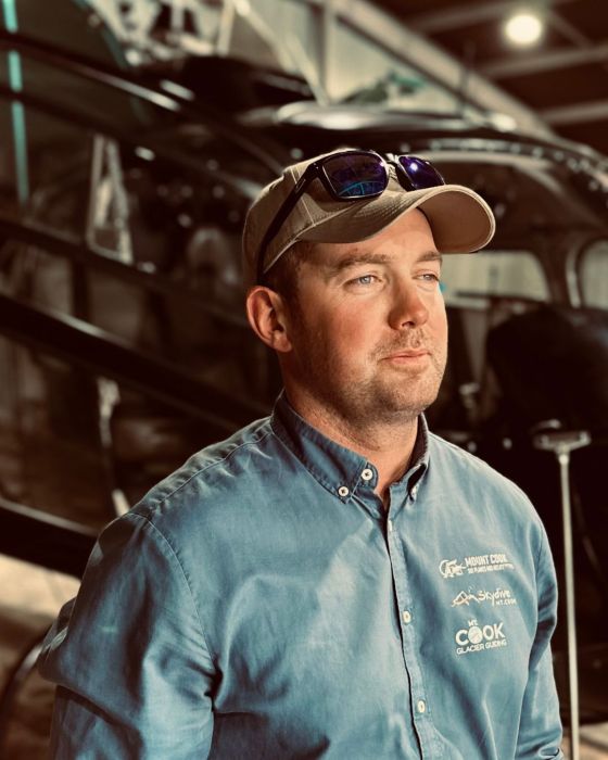 a man wearing a hat and glasses